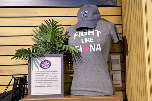 A Fight Like Fiona t shirt on display on a mannequin in a zoo gift shop